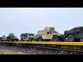 KCS Gevo leads a Military train past O’Hare airport on its way to Fort McCoy