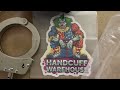 Package unboxing from Handcuff Warehouse. Two new handcuffs, one case and one swivel handcuff key.