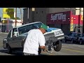 LOWRIDER CARS HOPPING AND 3 WHEELING in Los Angeles California