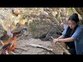 Girl makes discarded plastic bottles to use to catch fish on stream banks after a storm