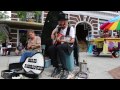 Chris Rodrigues and Abby the Spoon Lady Busking in Asheville, NC