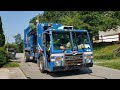 Republic Services Mack LEU Mcneilus M/A side loader on residential recycling route.