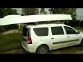 Loading a boat on a car roof. Погрузка лодки на крышу машины.