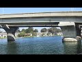 Oakland Strokes Freshman 8 going under a bridge at head of the lagoon.