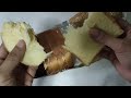 Unwrapping Plain Brioche Loaf
