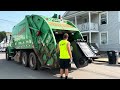 Green Garbage Truck Gobbling New Hampshire Trash