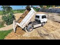 Transaction Filling Up The Land, By Bulldozer KOMATSU D31p, Dump Truck 5Ton Unloading