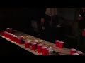 Grandma plays beer pong