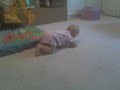 Avery trying to crawl