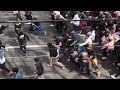 Protesters storm through police line in Melbourne.