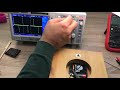 Inside of a wall clock ( measurement of voltage waveform across the coil and the oscillator )