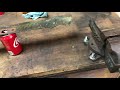 Straightening a bent mower blade