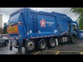 Republic Services Mack MRU Heil front loader on a Commercial recycling route.