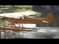 Landing And Taxi of a PJ3 Piper Cub Float Plane At Jack Brown's Seaplane Base