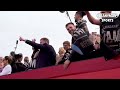 INCREDIBLE SCENES as Ryan Reynolds and Rob McElhenney celebrate Wrexham promotion with bus parade
