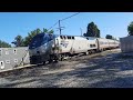 Train meet: NS gondola train meets Amtrak P351-10 at Porter