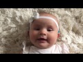 Baby puts on hearing aids for the first time