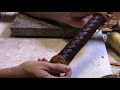 Braided leather handle wrap on a tomahawk or belt ax