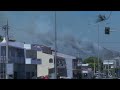 Smoke plumes darken sky as firefighters battle wildfire on hills northeast of Athens