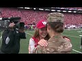 Army Captain surprises daughter at Wisconsin Football Game