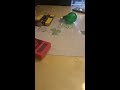 Brother lights a light bulb with batteries