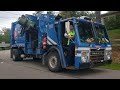 Republic Services Mack LEU Mcneilus M/A side loader on residential recycling route.