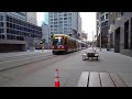 Two Minneapolis light rail trains passing. Cool motor sound.