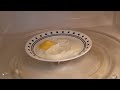 EGG EXPLODES! Cooking an egg in the microwave for 30 seconds