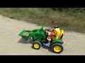 Truck stuck in the mud - Rubble ride on power wheels tractor to help