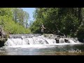 Fly fishing over a waterfall in New Brunswick Canada.