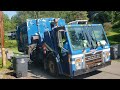 Republic Services Mack LEU Mcneilus M/A side loader on residential recycling route.