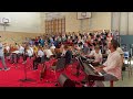 Evgeny Khmara playing with children choir Imagine for peace in Ukraine