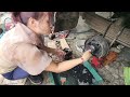 Genius girl repairs and restores car wheels.