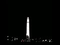 The Washington Monument,  lit up.