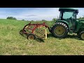 Raking Hay with New Holland 258 rake