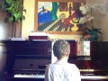 Six year old playing the Hanon exercises, scales and Minuet.