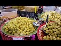 $ 0.80 Food For Lunch, Fried Fish, Northern Spicy Sausage, in Chiang Mai Market