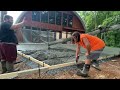 Adding a concrete patio onto the apartment in the woods.