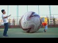 Beka Playing Soccer With Giant Ball