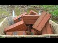 Building pig trough for pig herd. Happy family life together - Thanh Hien Family Farm