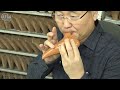 Process of making performance ocarina. Korean musical instrument manufacturing factory