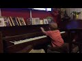 visiting my grandma in Scotland,having a giid time playing with her piano