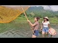 Two sisters used a fishing net on the lake, caught a lot of fish and then sold them