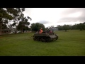 Universal Carrier and M3 Stuart Tank Driving Around the Paddock