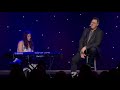 Vince Gill and Corrina Grant Gill perform 