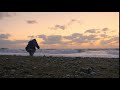 the man photographs the sea sunset