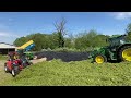 Cumbrian Silage 2024. Nine strong John Deere, MF, NH team with three machines filling both clamps.