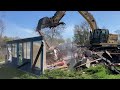 Epic House Demolition: Witness the Power of a Caterpillar 323 Excavator!