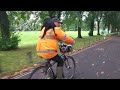 Dog on owners shoulders while riding a bike 😱😁