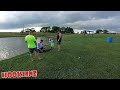 Fishing pole gets smoked 2 foot off the bank. 6 year old reels in big fish in fourth of July tourney